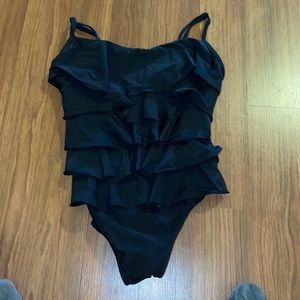 Ruffled black one piece swim suit